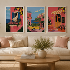 Living room with a white sofa, colorful wall art, and a wooden coffee table.